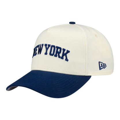 New Era Knicks Chrome White/Navy New York Wordmark 940 A-Frame Snapback In White - Front Left View