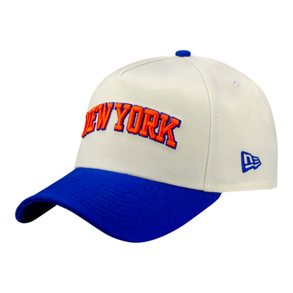 New Era Knicks New York Wordmark Two-Tone Chrome/Royal 940 A-Frame Snapback In White - Front Left View
