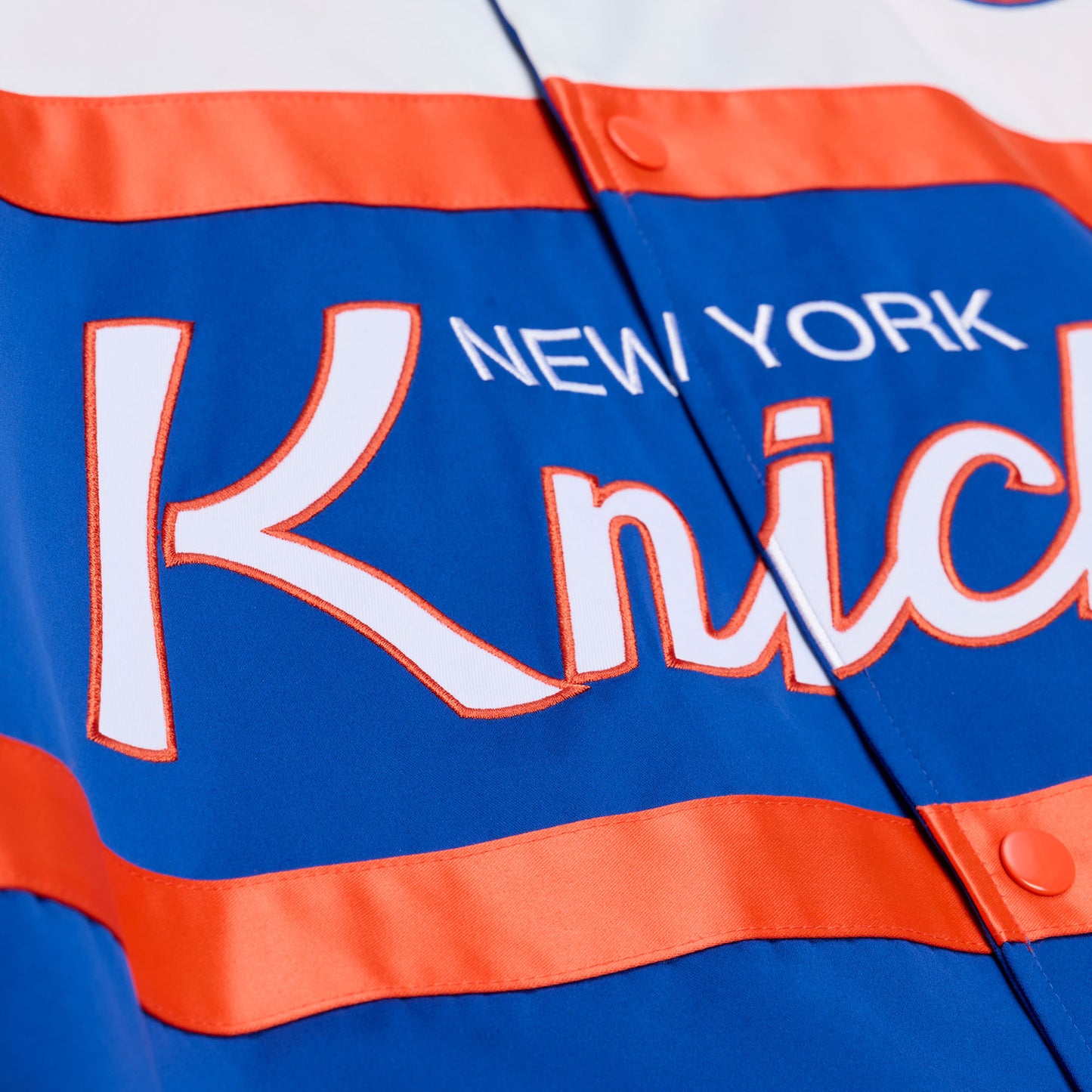 Mitchell & Ness Knicks Team Color Head Coach Lightweight Satin Jacket - Wordmark View