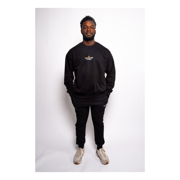 State of Mind - The Believe Crewneck In Black - Front View On Model