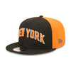 New Era Knicks City Edition 22-23 Official Snapback Hat In Black & Orange - Angled Left Side View