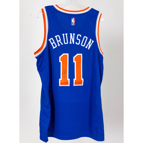 #11 Jalen Brunson Package - Autographed Player-Worn Playoffs Warm-Up Shirt & Autographed Jersey In Blue - Back View