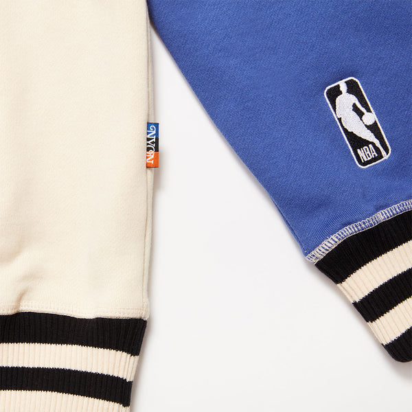 NYON X KNICKS ALWAYS NYK HOODIE in White, Blue and Orange - Front View Close Up of Right Sleeve with Logo